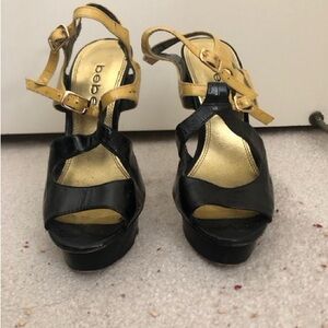 Bebe Black and Gold Heels